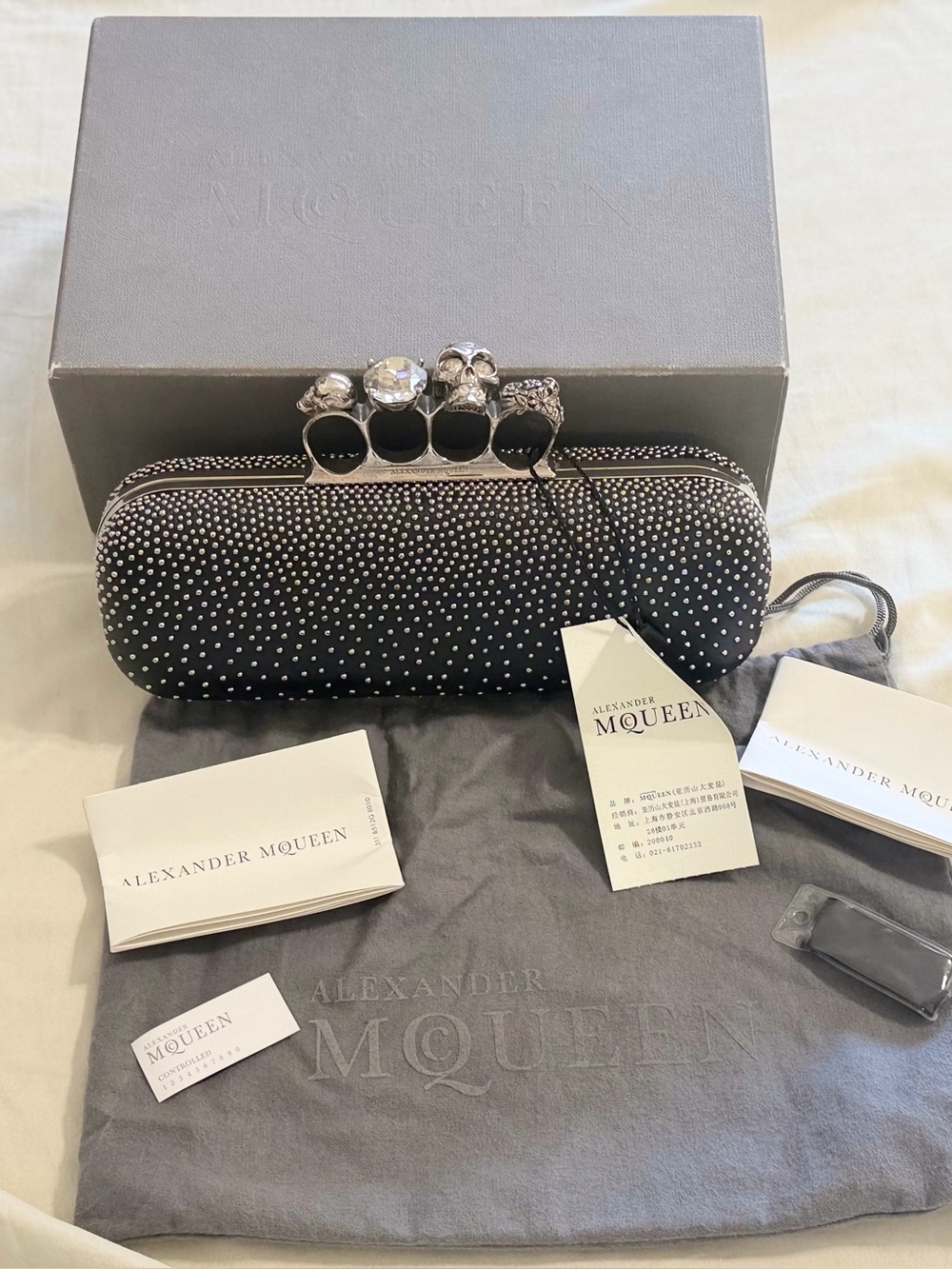 Authentic Alexander McQueen Leather knuckle Skulls Studs clutch Wallet in black